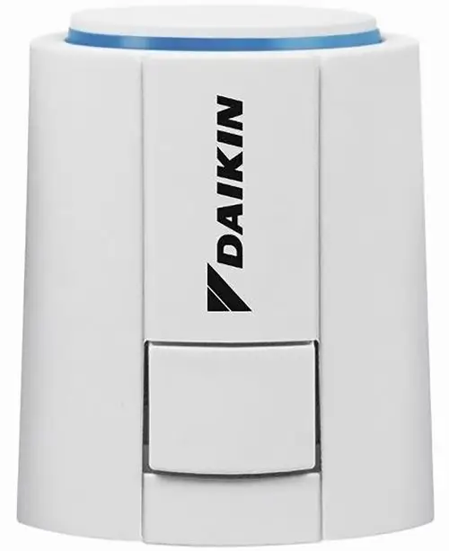 Weißer Stellantrieb von Daikin mit runder Oberseite und einem Schalter an der Vorderseite, geeignet für die Steckmontage.